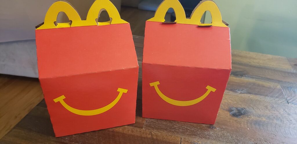 two happy meal boxes