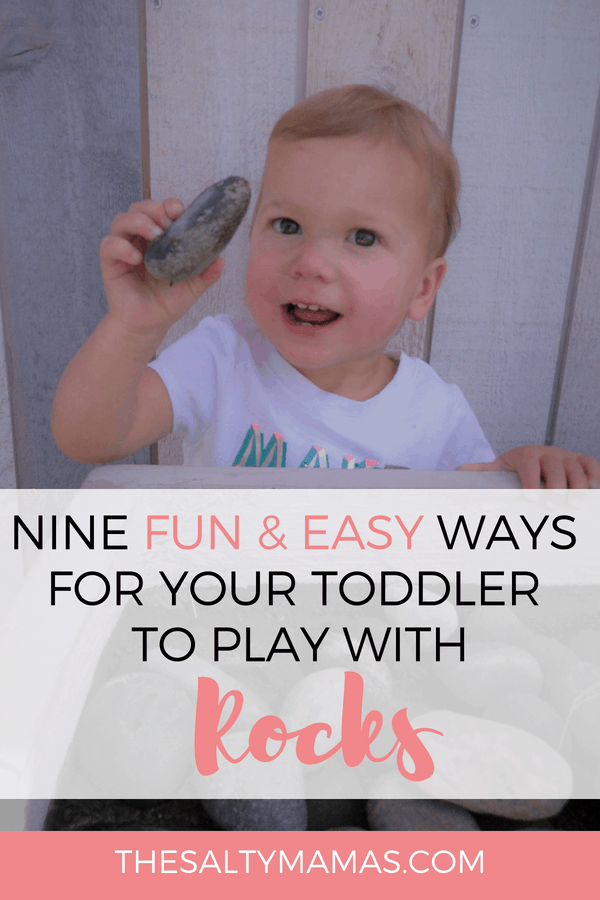 Toddler holding rock up; Text Overlay: Nine fun & easy ways for your toddler to play with rocks.