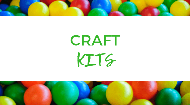 Backdrop of assorted M&M's. Text overlay: Craft Kits