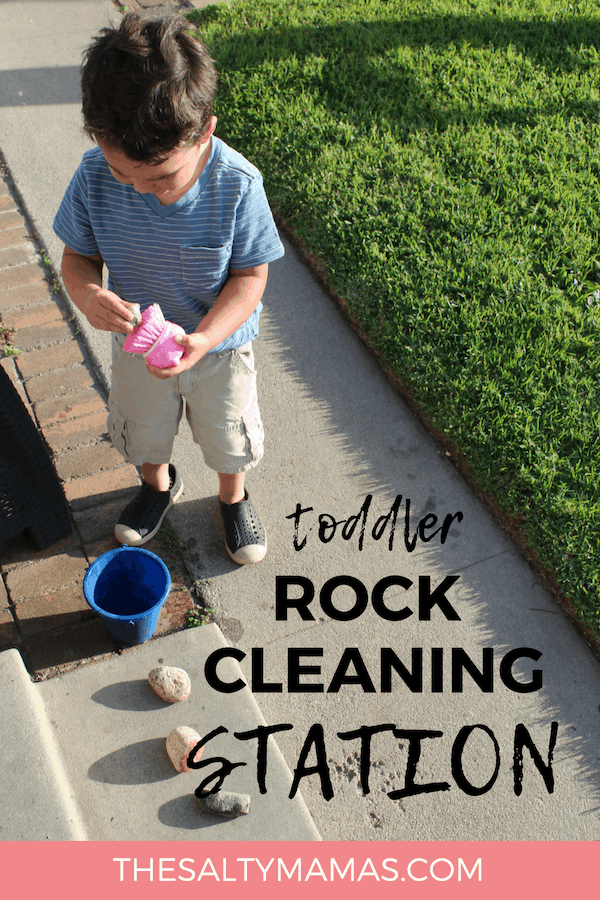 Toddler cleaning rock; Text overlay: Toddler rock cleaning station.