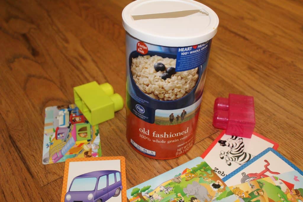 an oatmeal can with a slit in the lid; flash cards