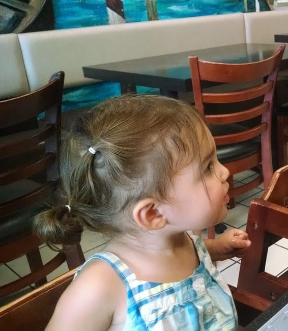 toddler with three-tiered pigtails