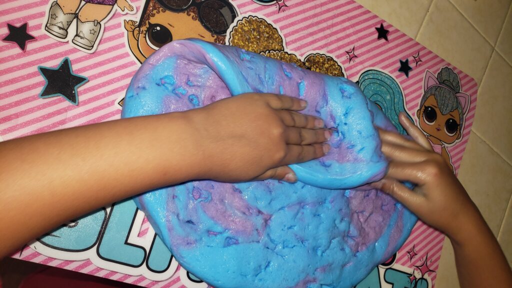 child playing with slime