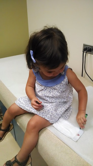 one year old at the doctor