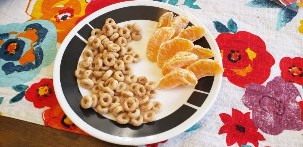 anemia friendly snack: cheerios and tangerine