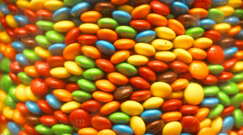 A glorious stack of M&M's all different colors. 