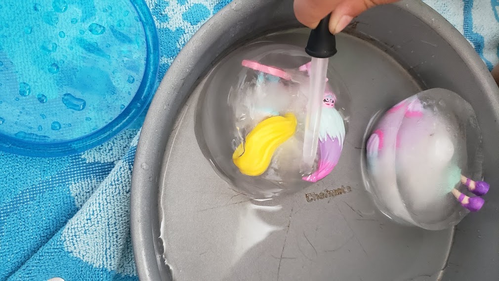 toys frozen in water