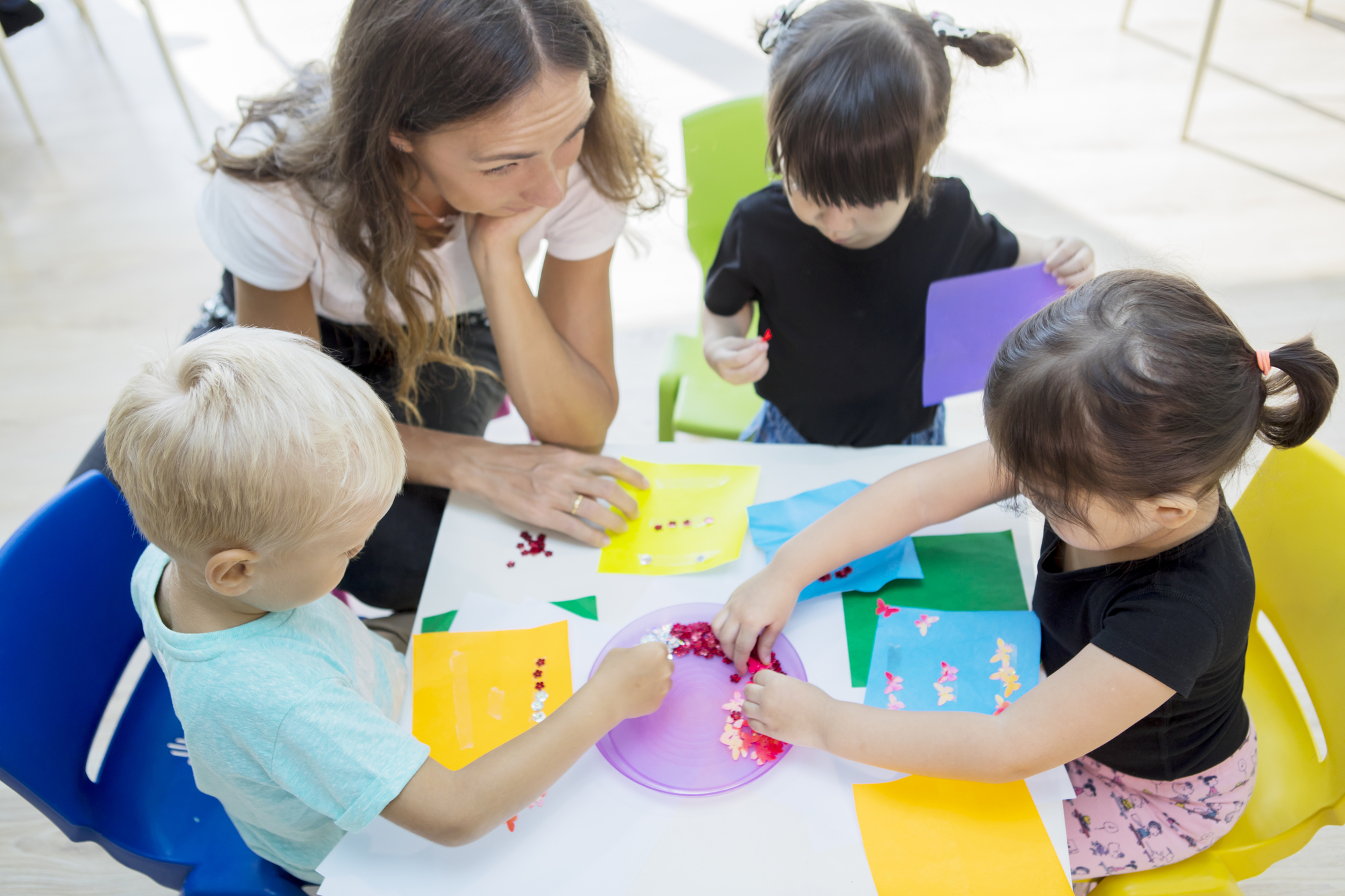 toddler doing color themed art