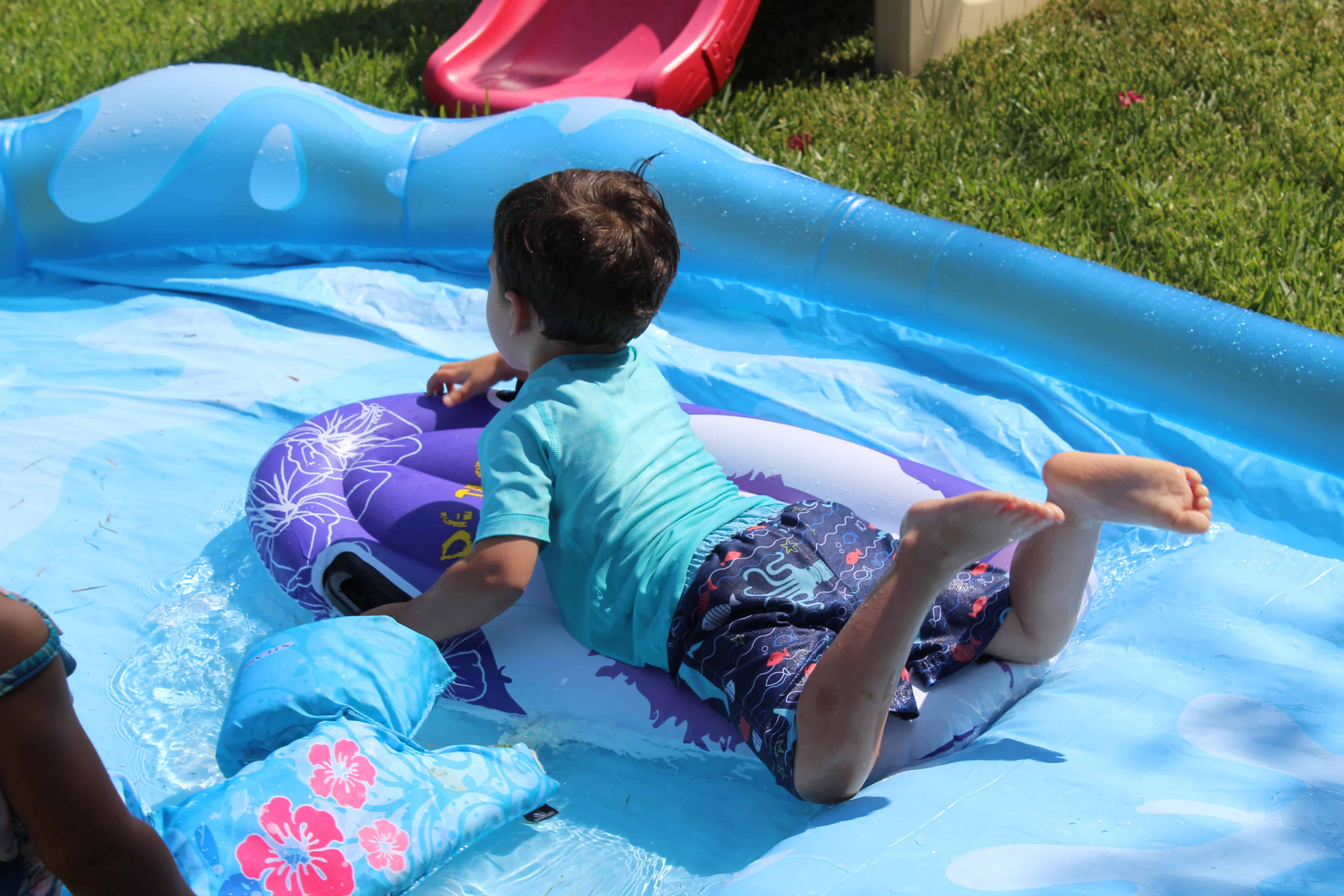 boy on water slide