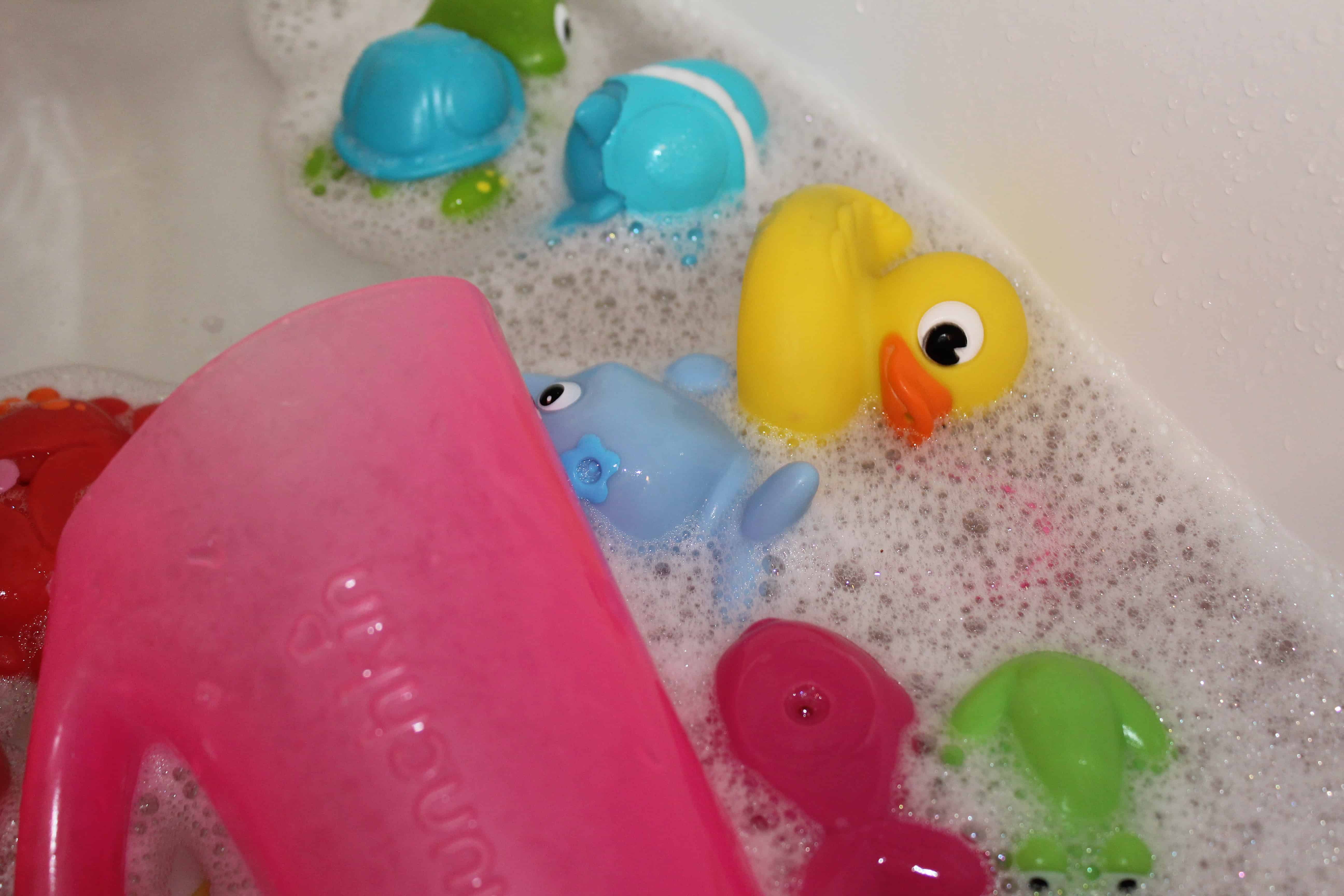 Bathtub toys in soapy water