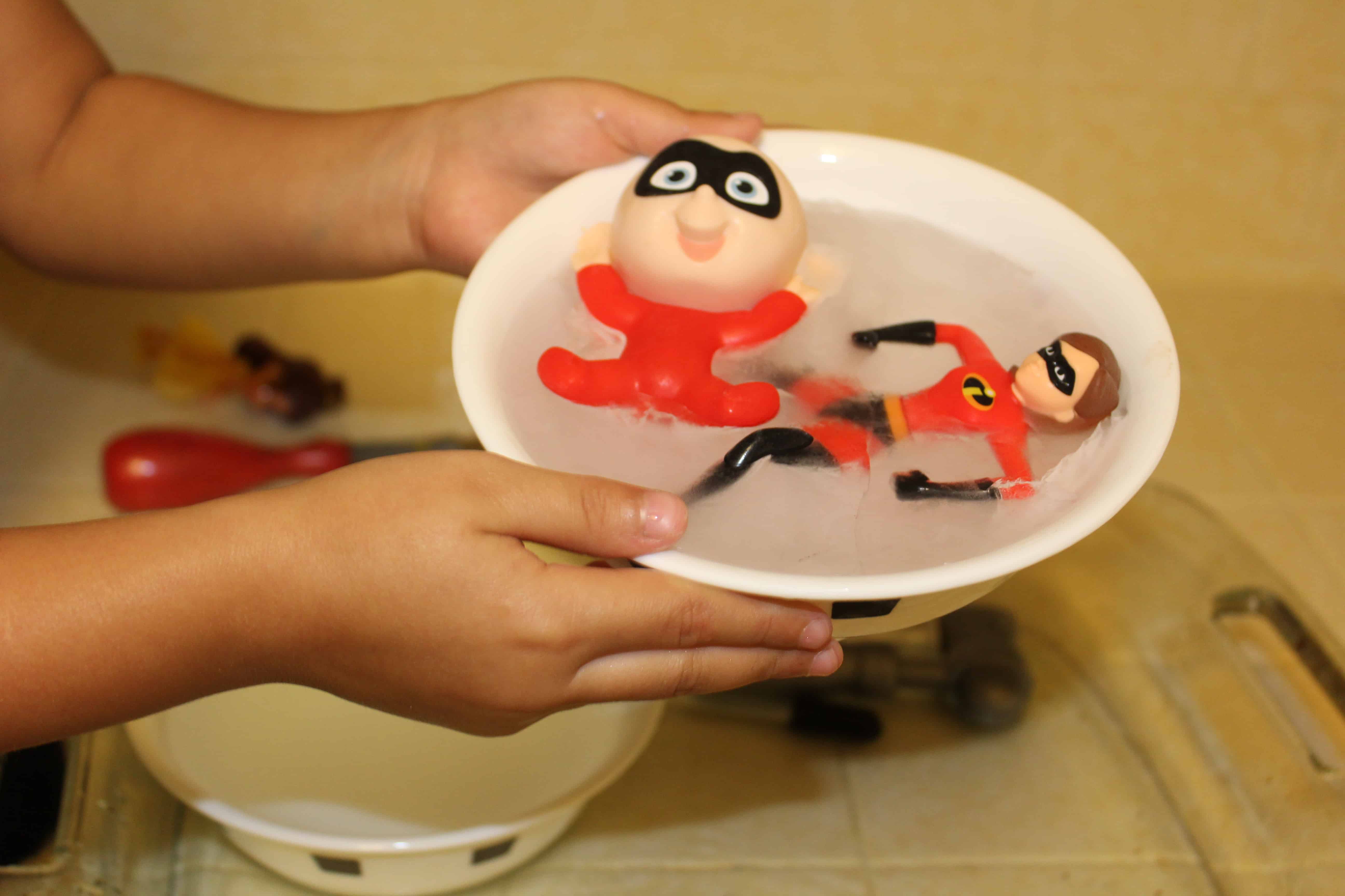 Baby jack jack and Elastigirl frozen in a bowl of ice. 