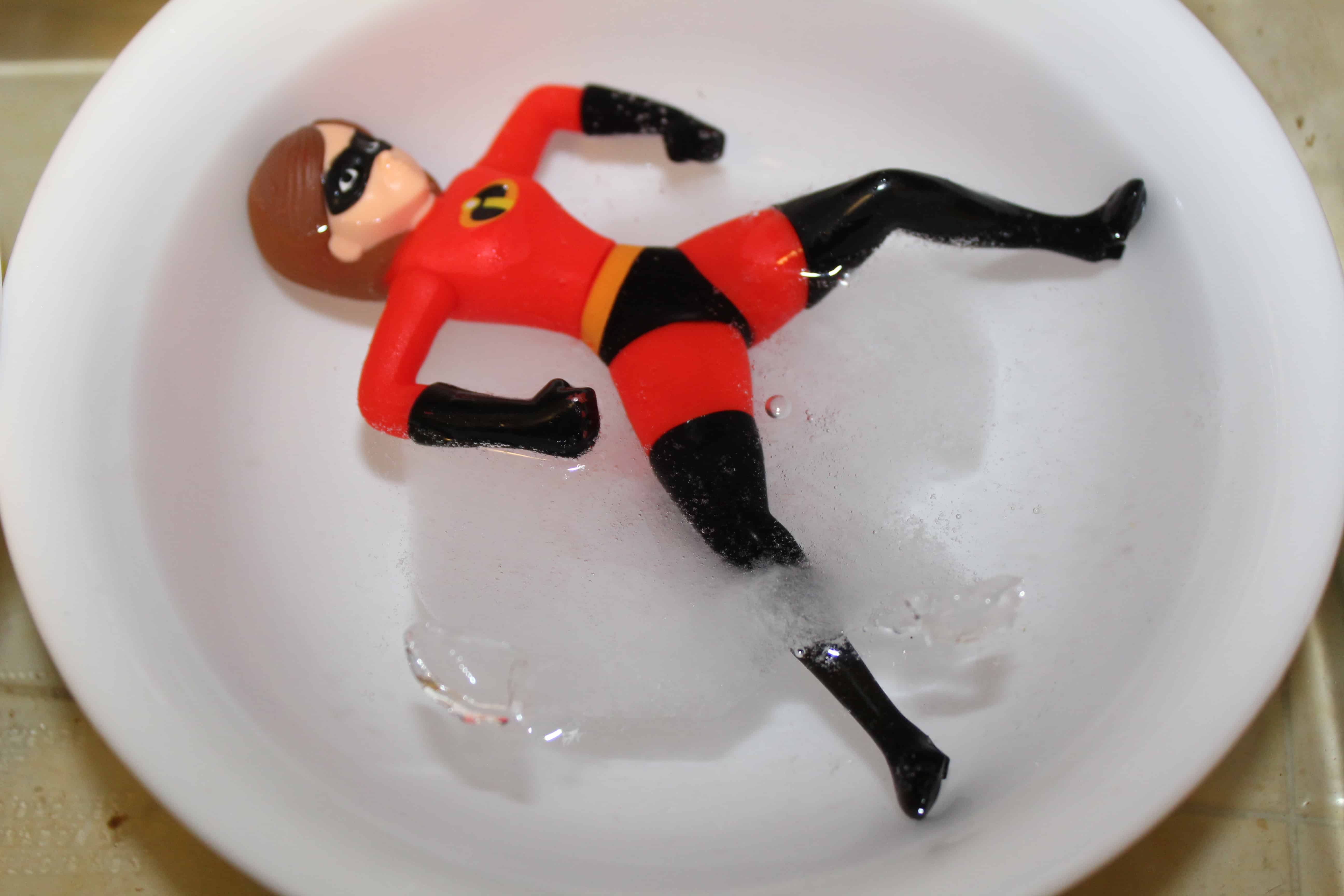 Elastigirl defrosting in a bowl of warm water. 