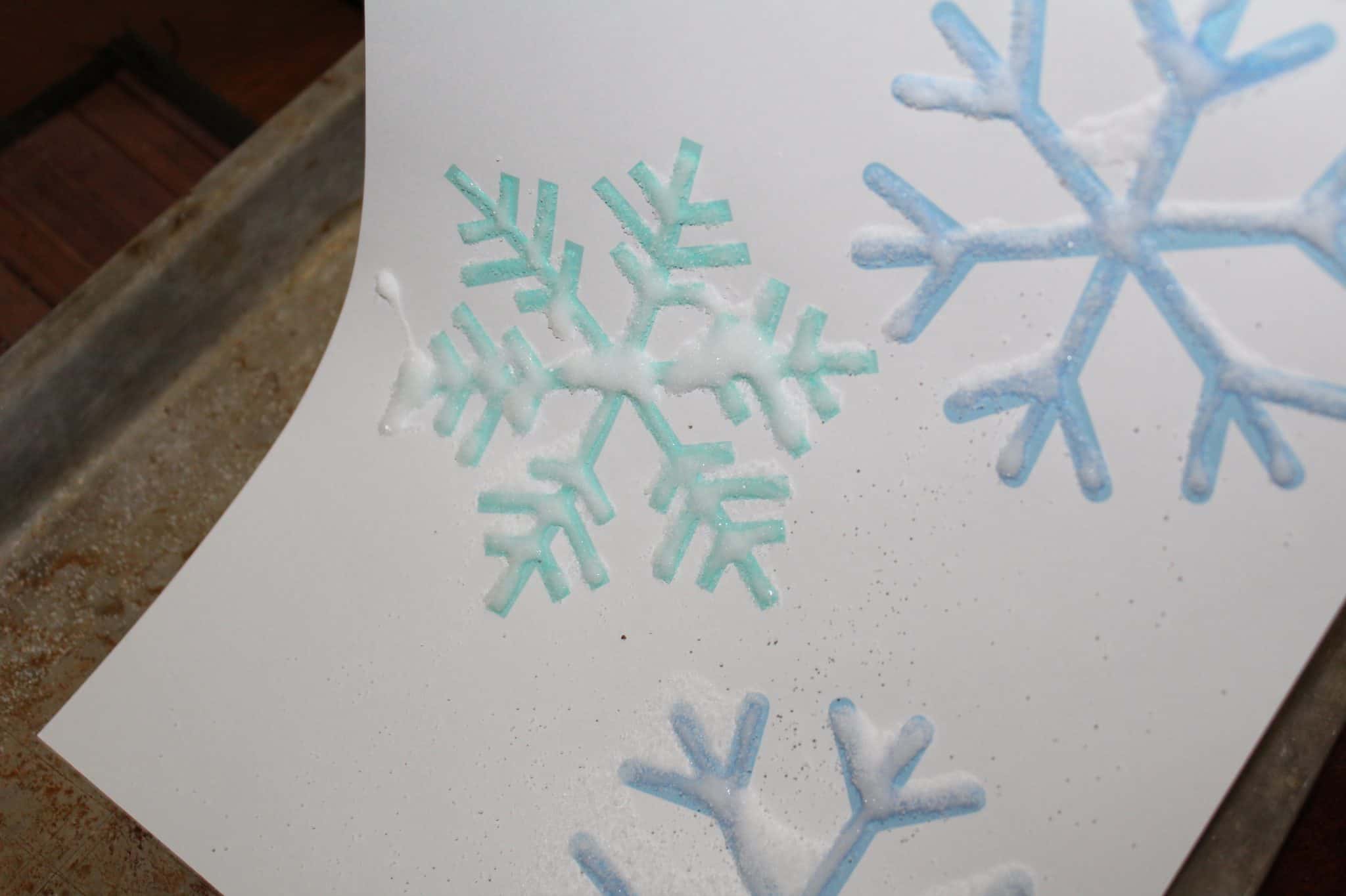 Painting Snowflakes with a Homemade Straw Stamp - Artsy Momma