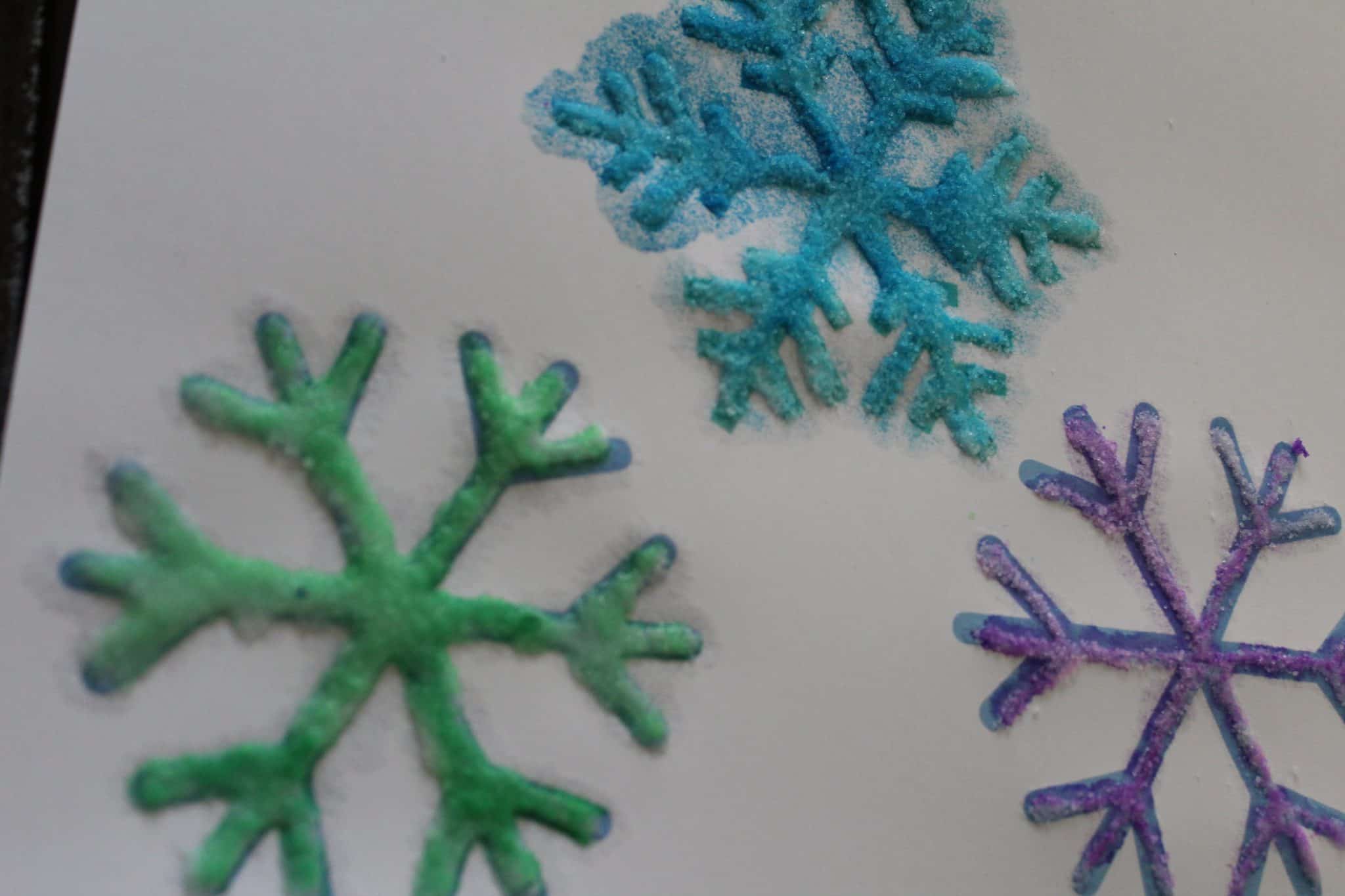 Painting Snowflakes with a Homemade Straw Stamp - Artsy Momma