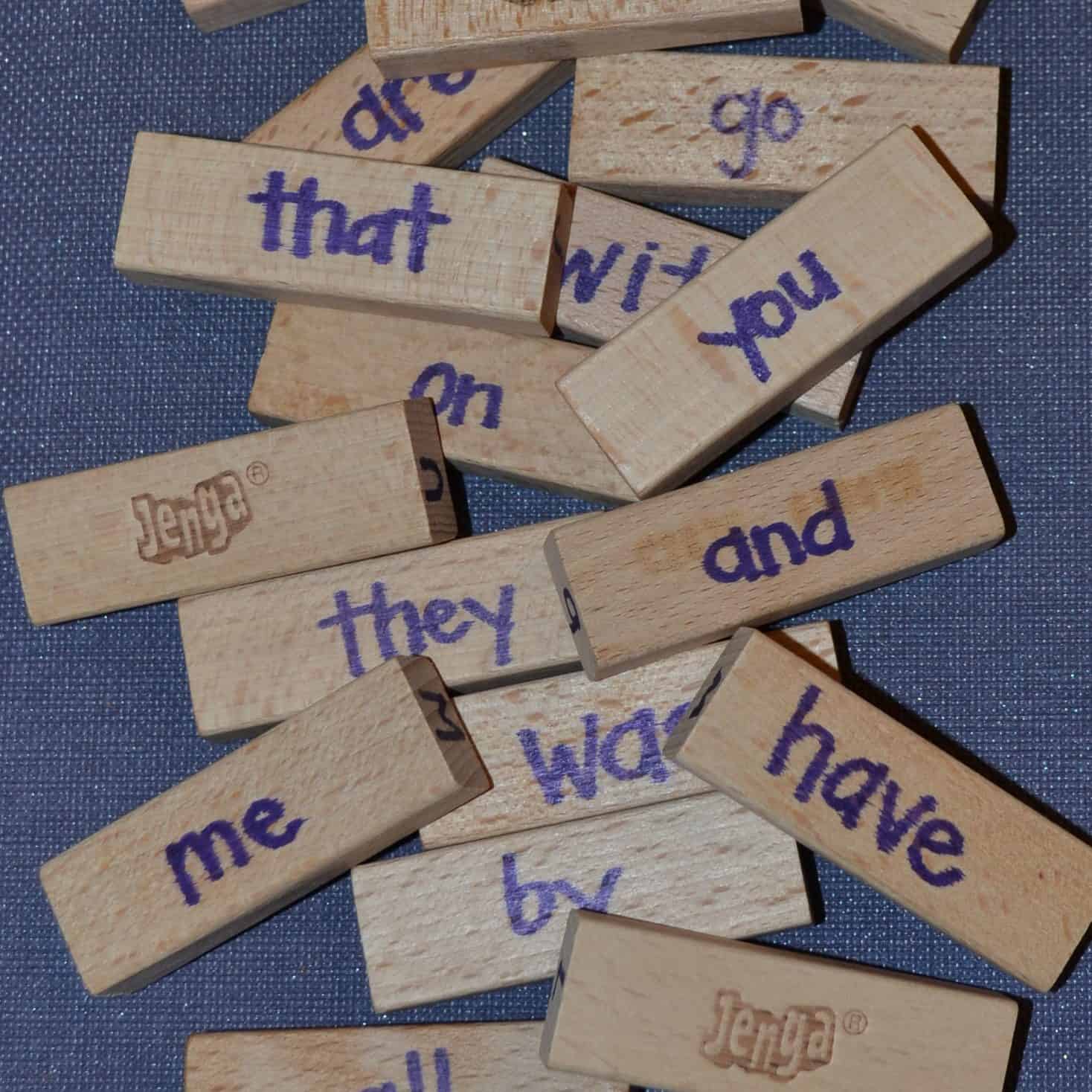 jenga blocks with sight words handwritten on them