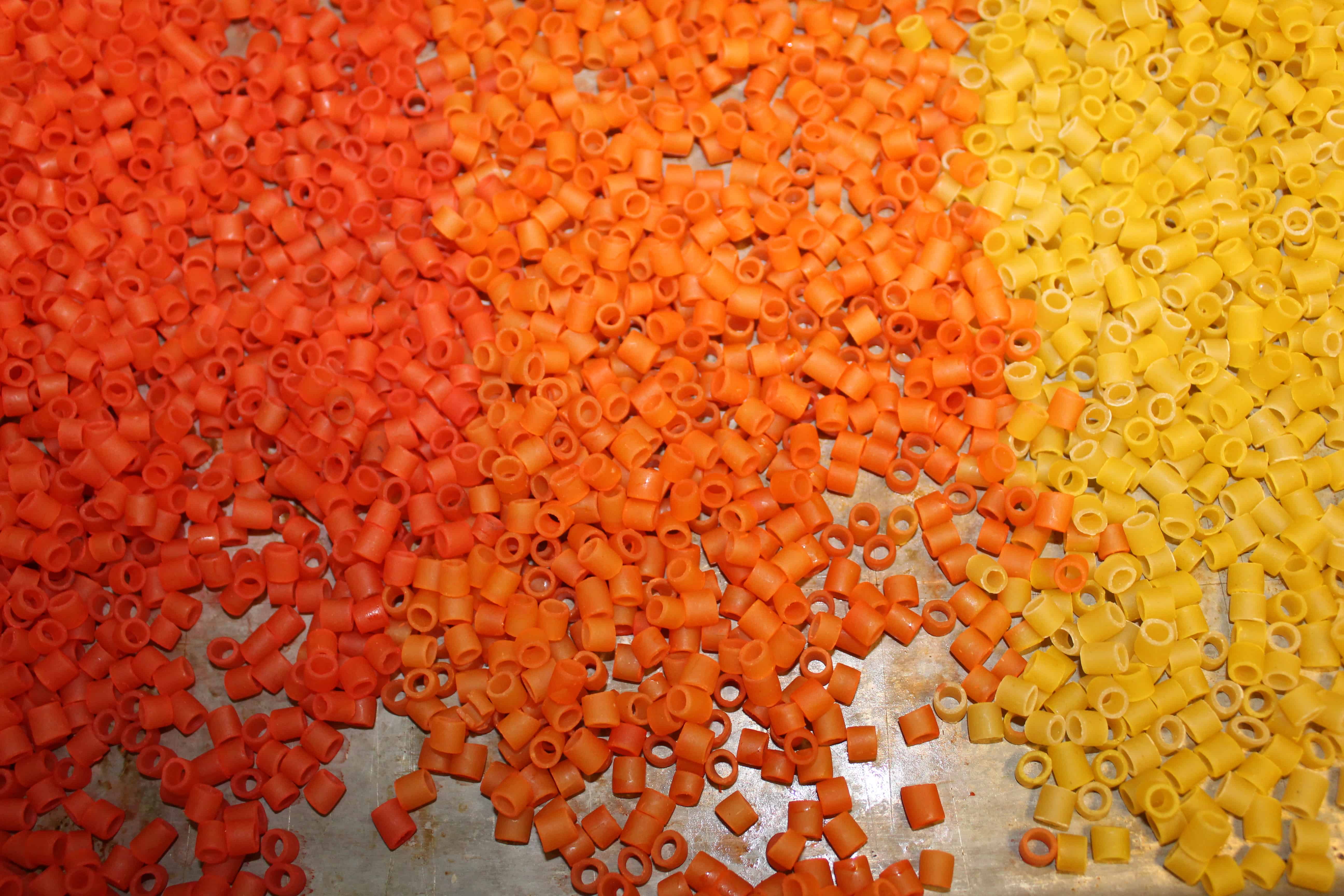 red, orange, yellow dyed pasta beads