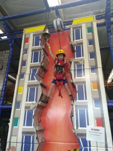 Don't miss your chance to climb the Kidz Town rock wall! (And check out other tips for visiting Kidz Town with toddlers from thesaltymamas.com) #KidzTown #bestkidsplayplace #indoorplay #bestindoorplayarea #indoorplayarea #indoorplayLongBeach #indoorplayLakewood