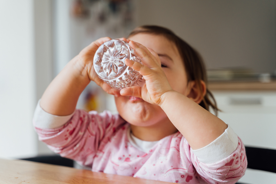 toddler drinking from cup
