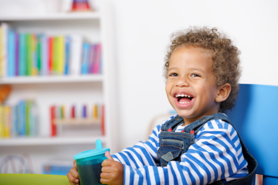 toddler happy with cup