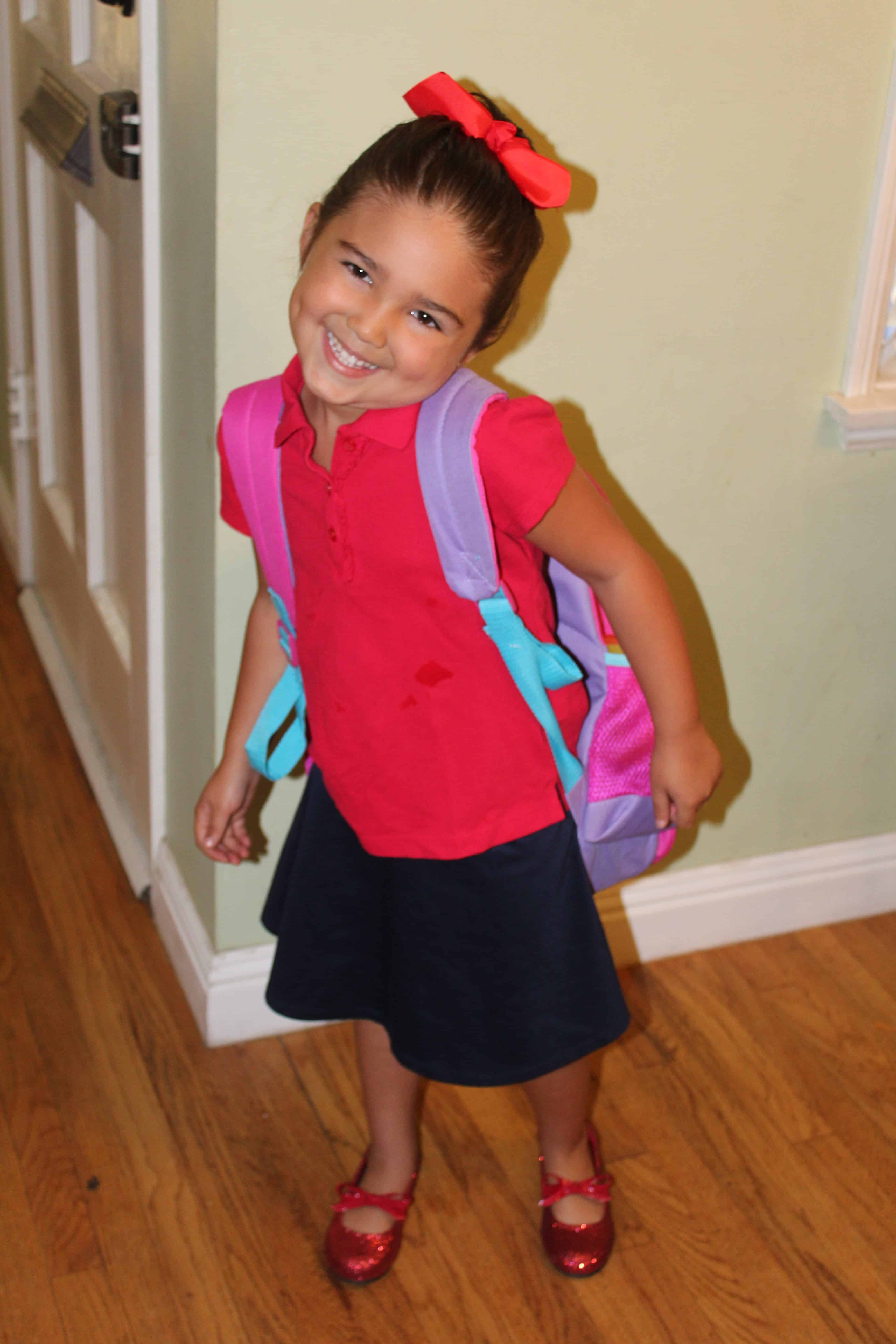 Smiling Child ready for school with their backpack!