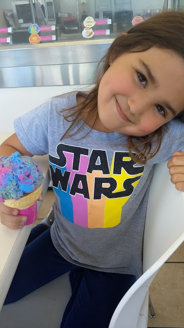 daughter eating ice cream on a mother-daughter date