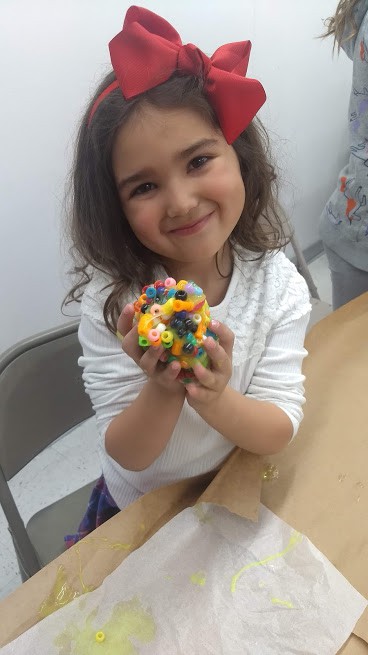 preschooler playing with slime