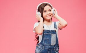 girl listening to a podcast on headphones