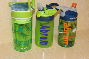 water bottles labeled with the name "abram"