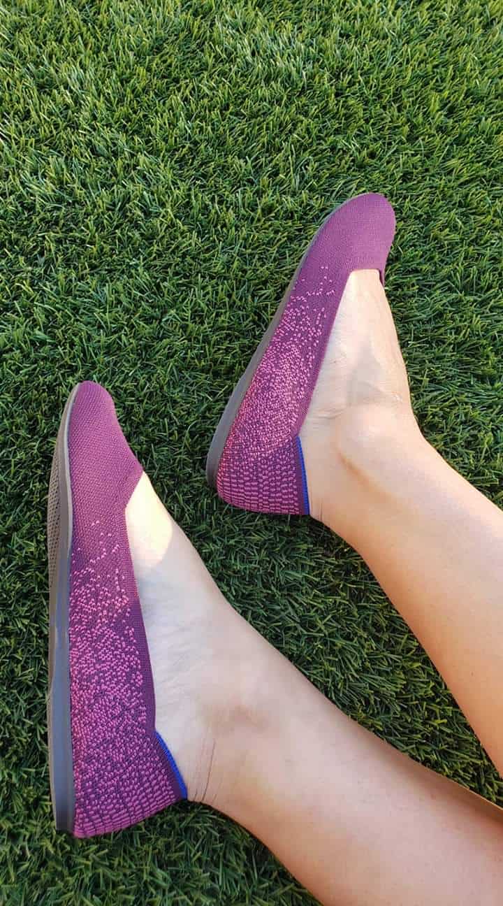 purple rothys on grass