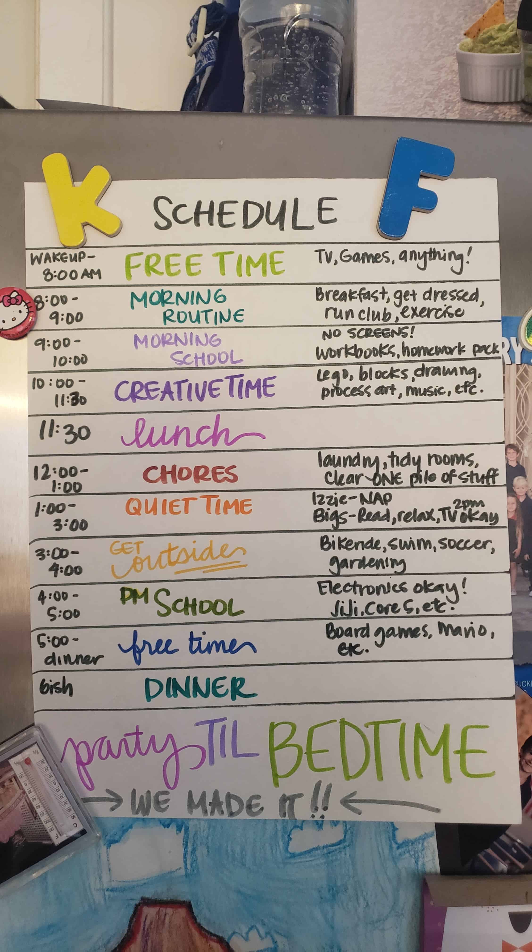 Written out daily schedule pinned to the fridge. 