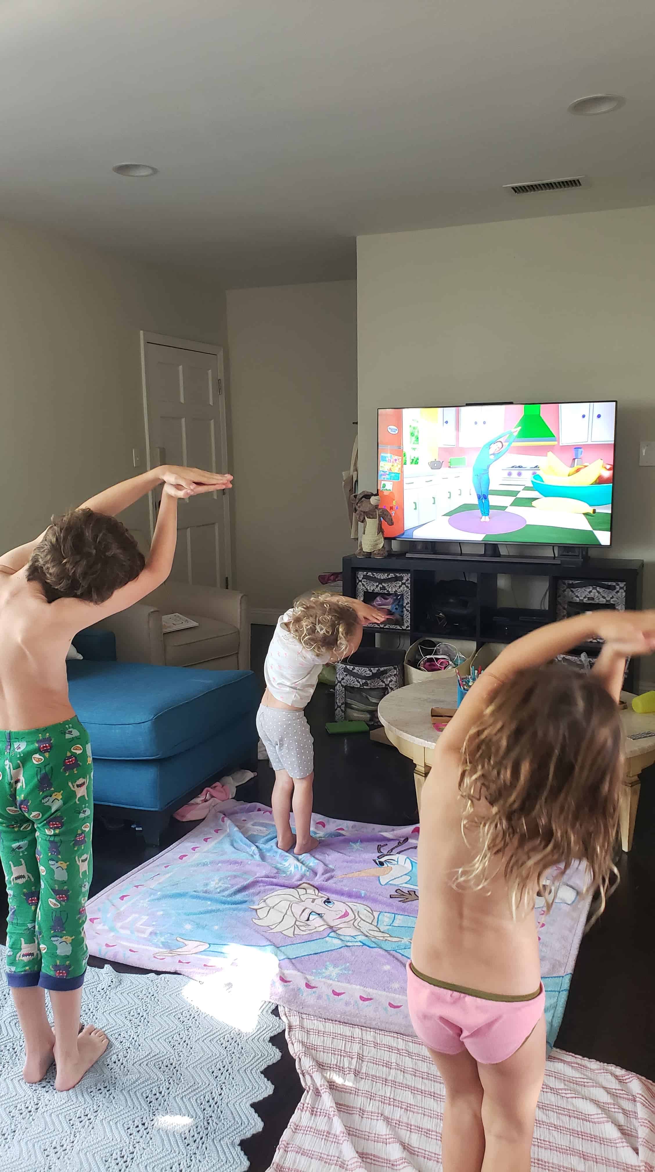 kids doing yoga to exercise during social distancing