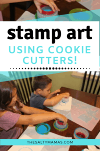 kids use cookie cutters and blue paint to make process art