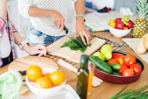 woman chopping vegetables