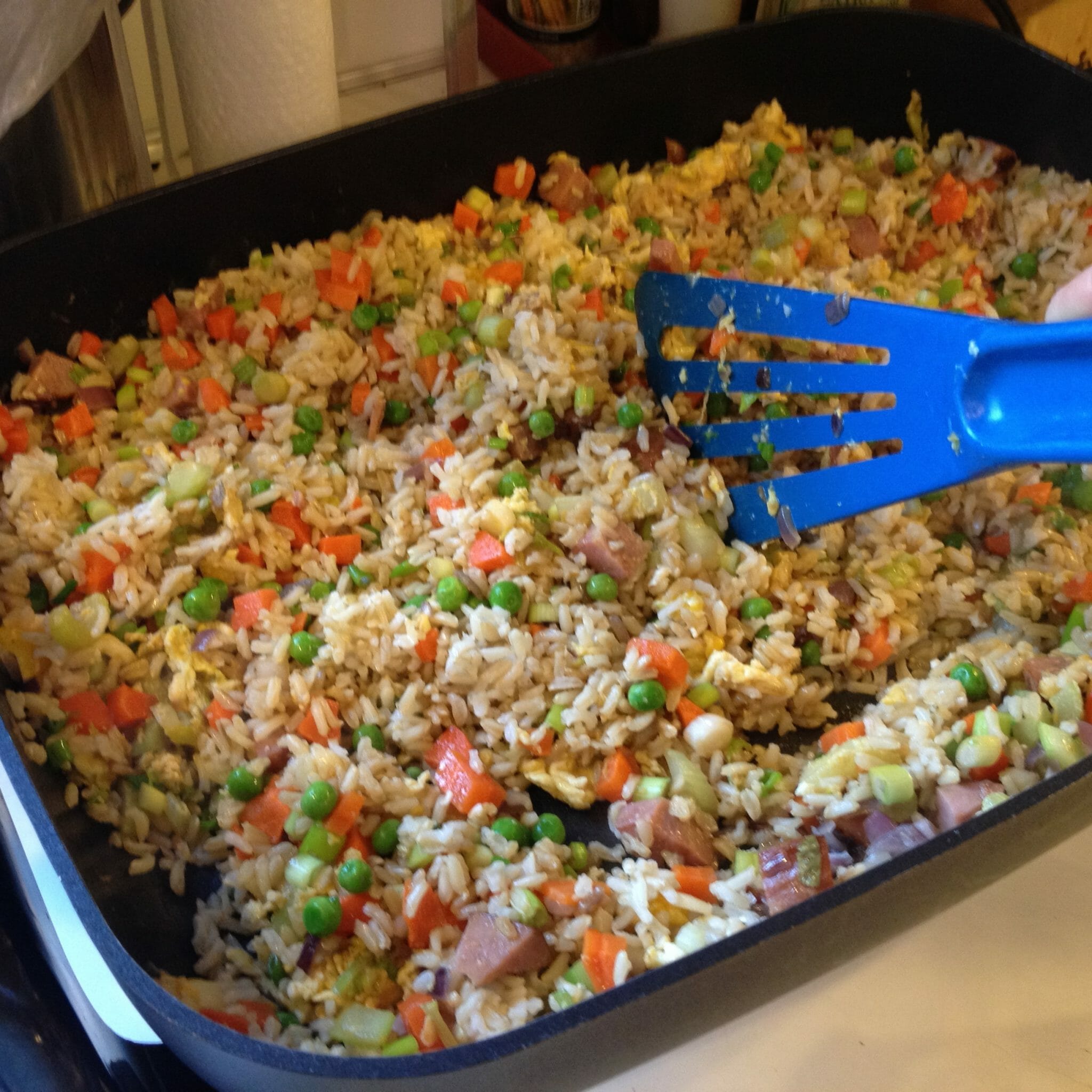 fried rice made with ham and veggies