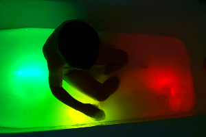 bathtub with glow sticks in it