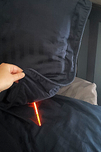 mom hiding glow sticks under a pillow