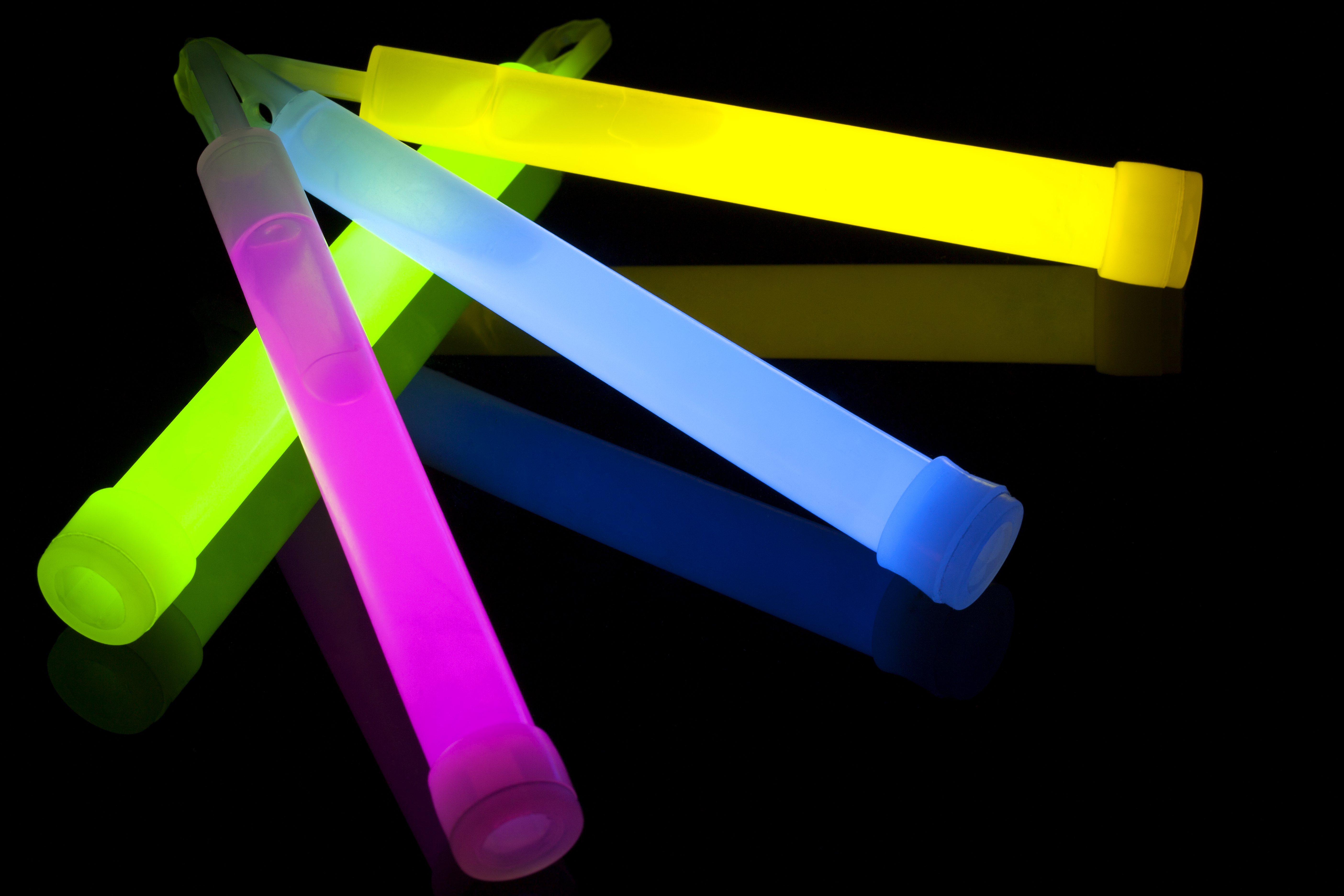 glow sticks on a black background