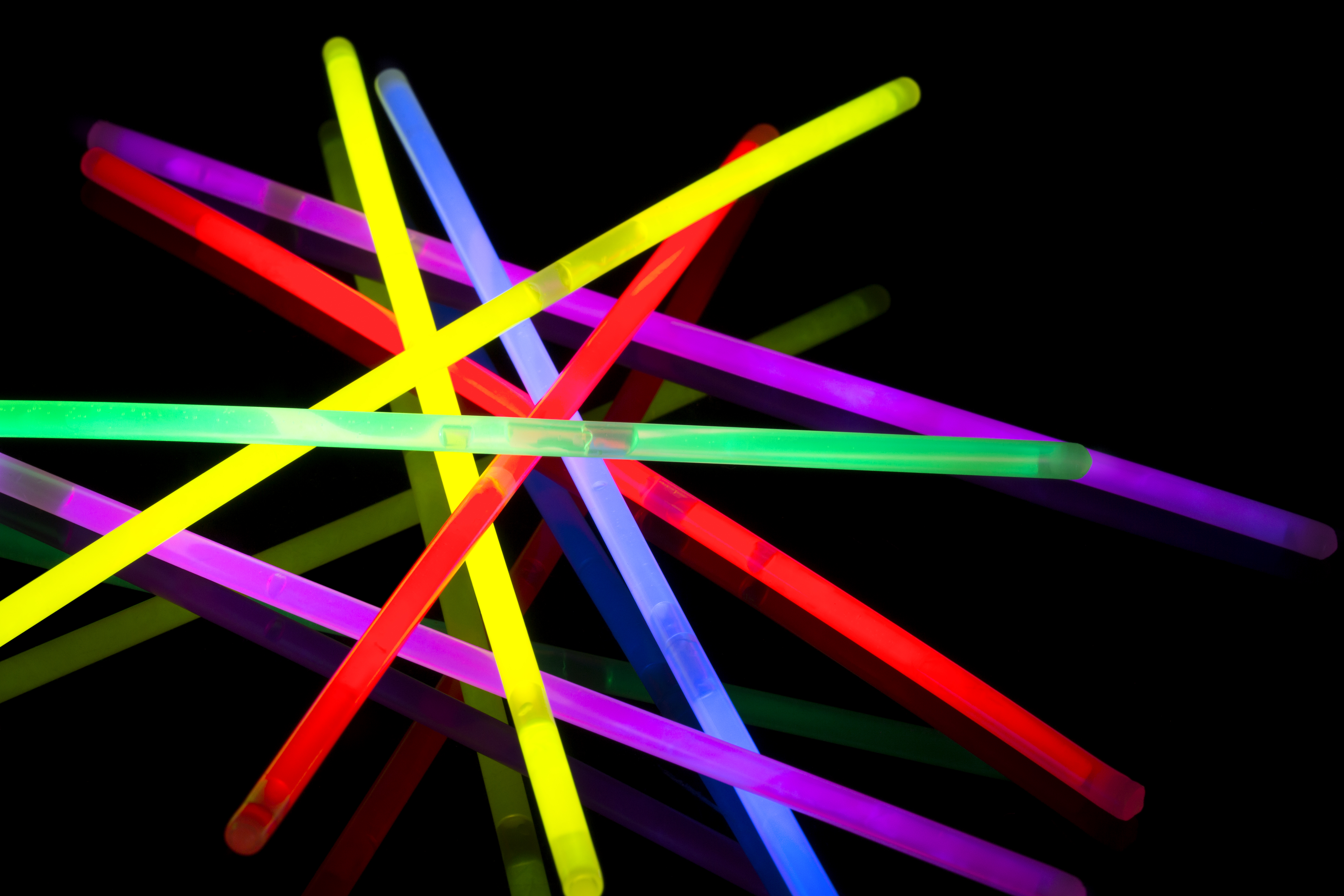 glow sticks on a black background