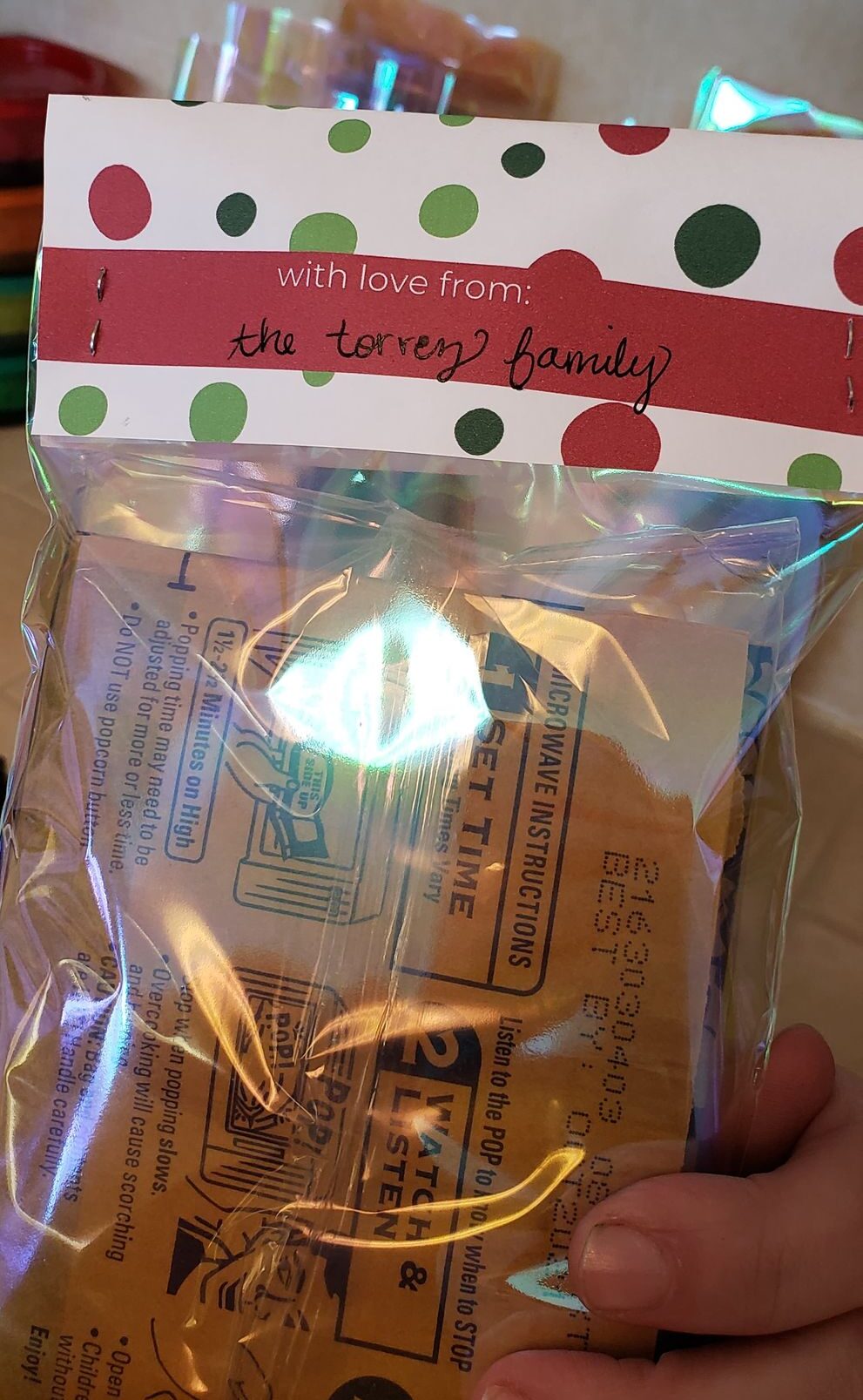 treat bags topped with paper reading "with love from the torrez family"