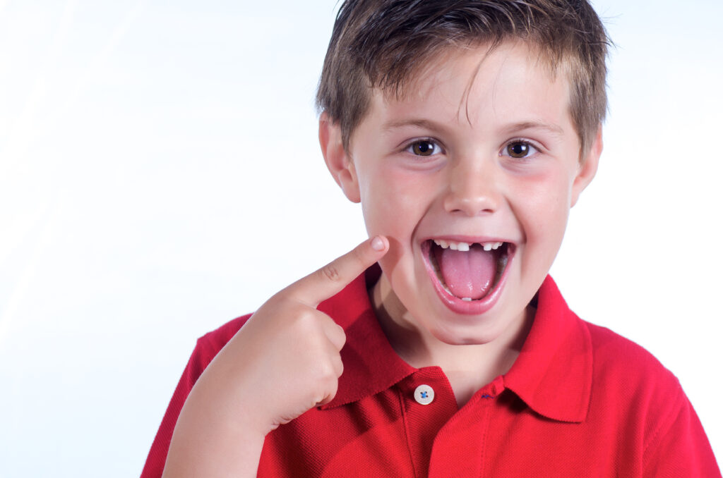 little boy who has lost a tooth