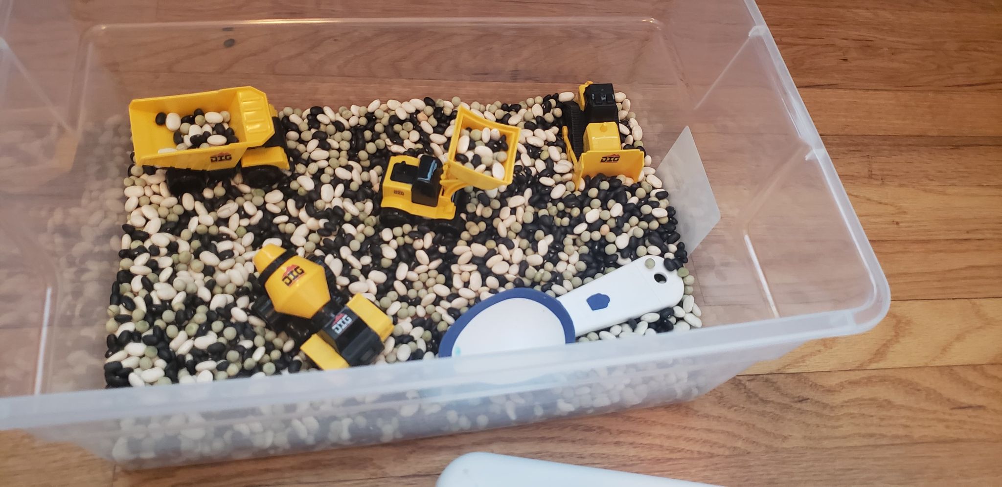 Construction Truck Sensory Bin - MamaMeganAllysa