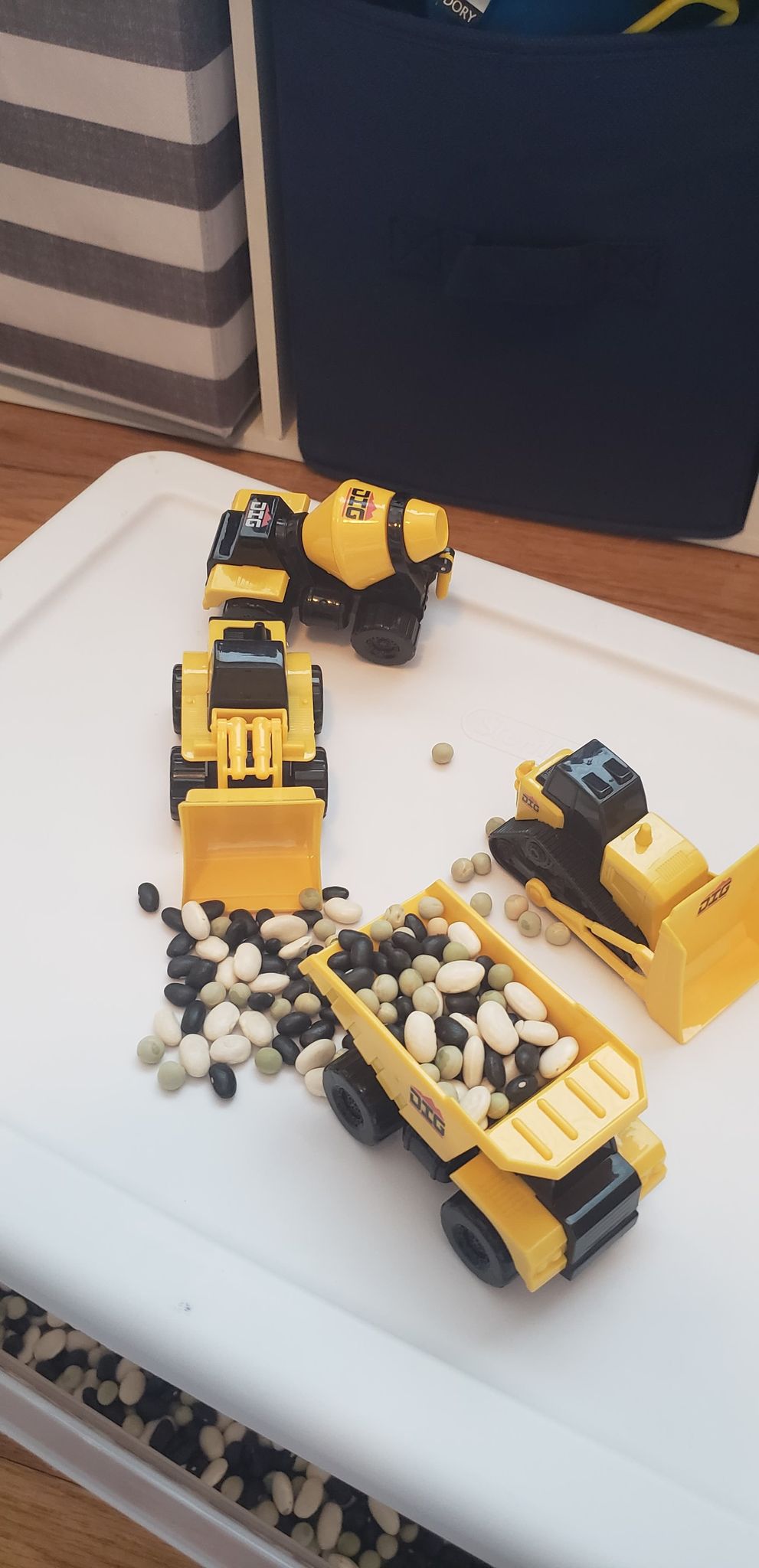 Construction Truck Sensory Bin - MamaMeganAllysa