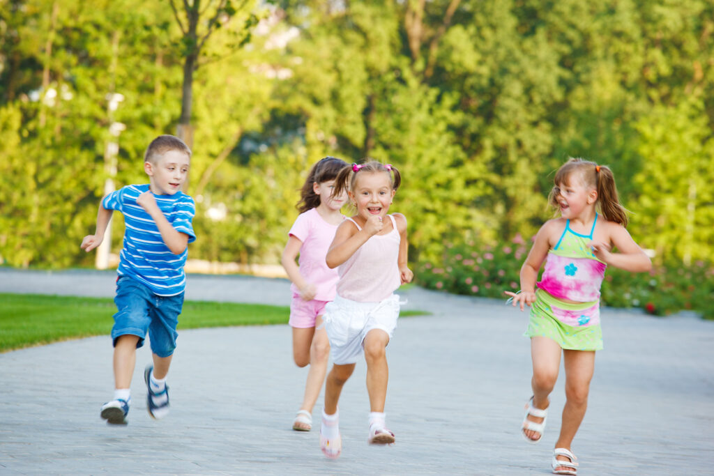 group of kids running while playing a game