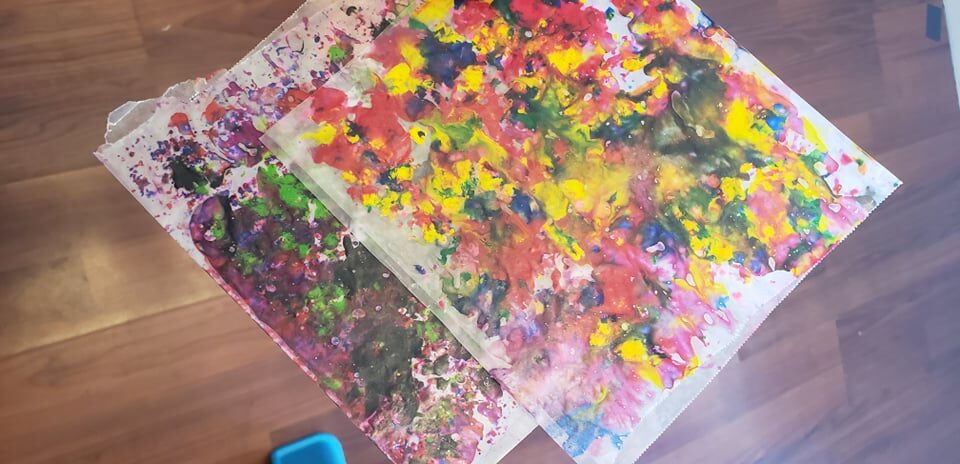 melted crayon shavings in wax paper