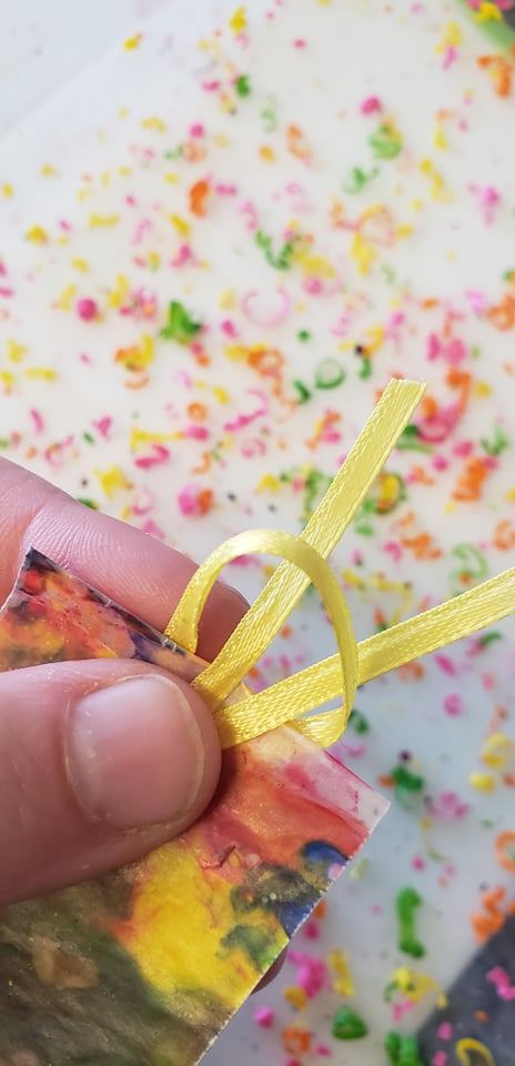 ribbon looped through top of bookmark