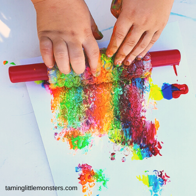 rolling pin wrapped in bubble wrap and paint