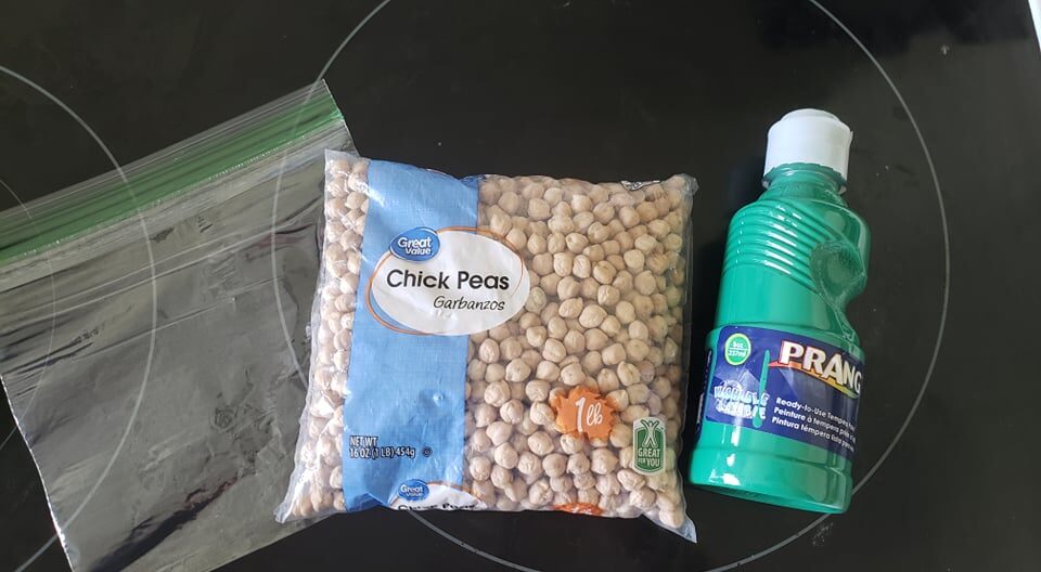 a ziploc, dried chickpeas, and paint