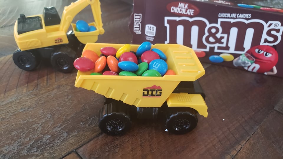 mini construction truck filled with M&Ms