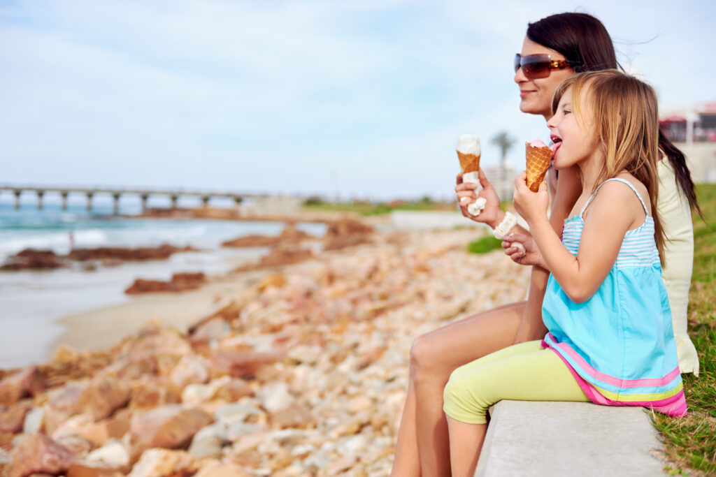 Mom and daughter enjoy ice cream together