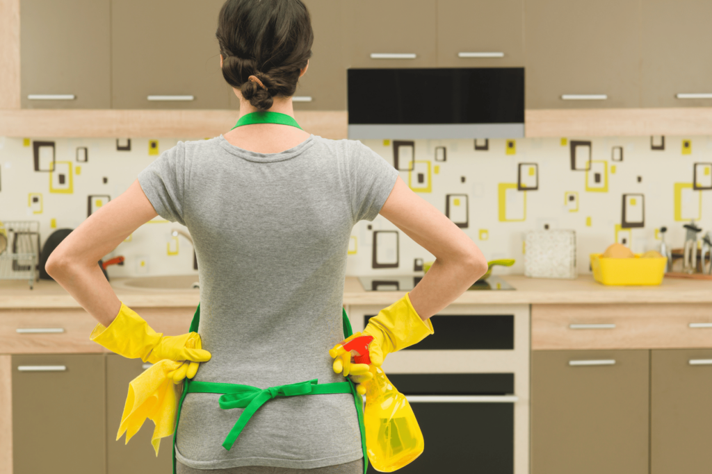 stay at home mom cleaning the kitchen